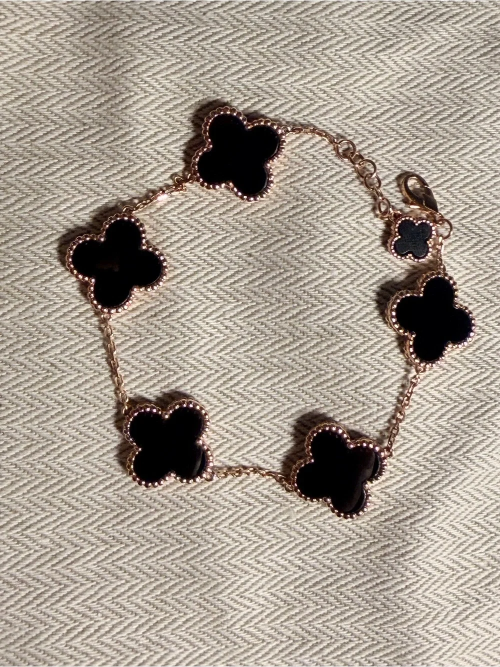 Van Cleef & Arpels Gold Bracelet with Black Alhambra Motifs
